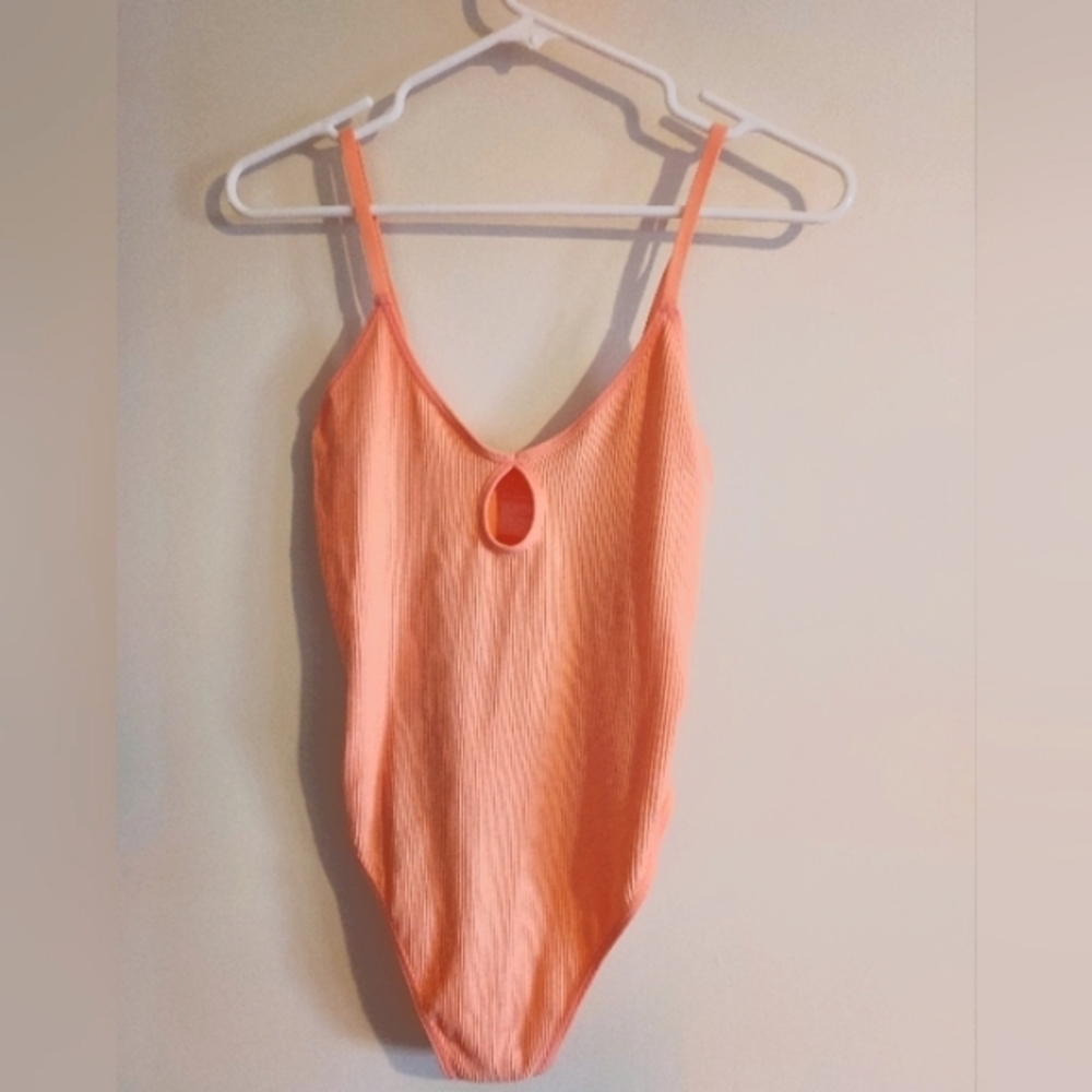 Coral Ribbed Thong Bodysuit. NWTs Colsie. Size Medium